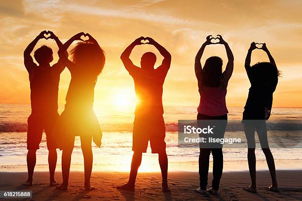 We Love Beach Stock Photo - Download Image Now - Friendship, Group Of People, In Silhouette