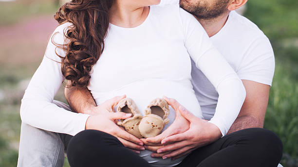 istock young couple expecting a new baby 618215998