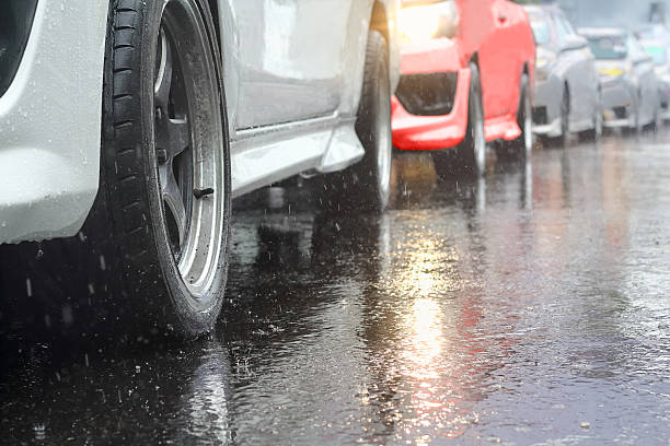 istock traffic jam in a rainy day 618218658