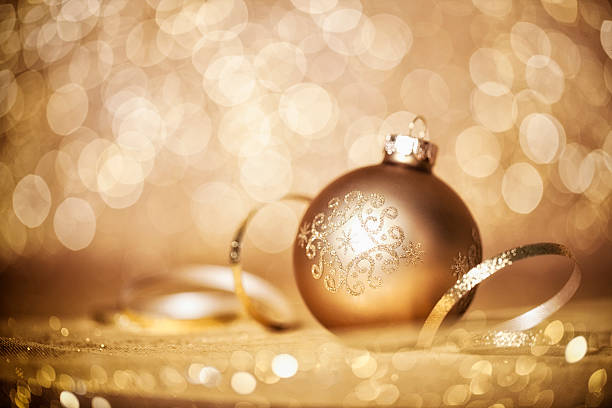 istock Christmas Bauble Gold against Defocused Lights 618219560