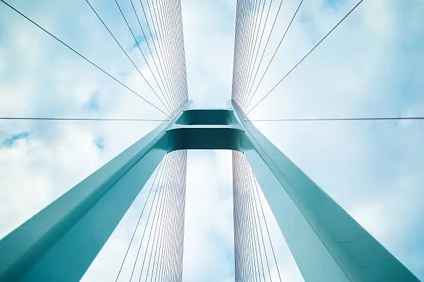 blue cable stayed bridge closeup, upward view