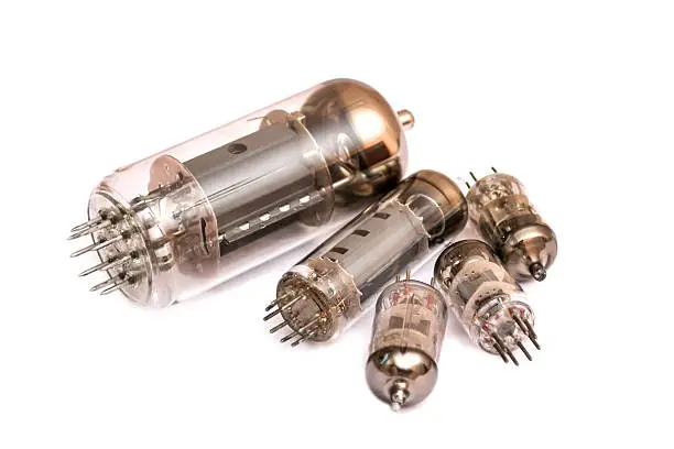 Group of old vacuum tubes isolated on the white background, radio valves