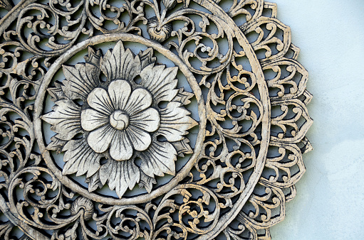 Close up of Thai traditional flower wood carving