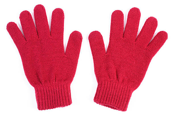 Pair of woolen gloves for woman on white background stock photo