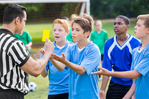 istock Teenage soccer player argues with referee 618317776