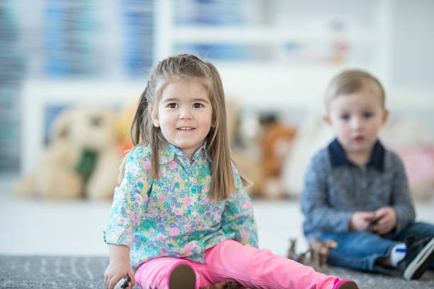 istock Toddlers Playing Together in Preschool 618317962