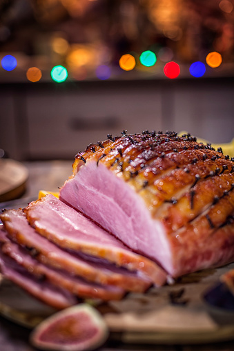 Delicous Glazed Holiday Ham with Cloves Served for Dinner