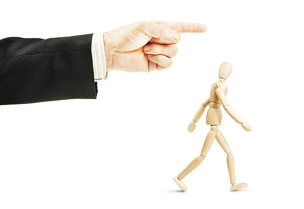 istock Man going in shown direction. Concept of full obedience 618319236