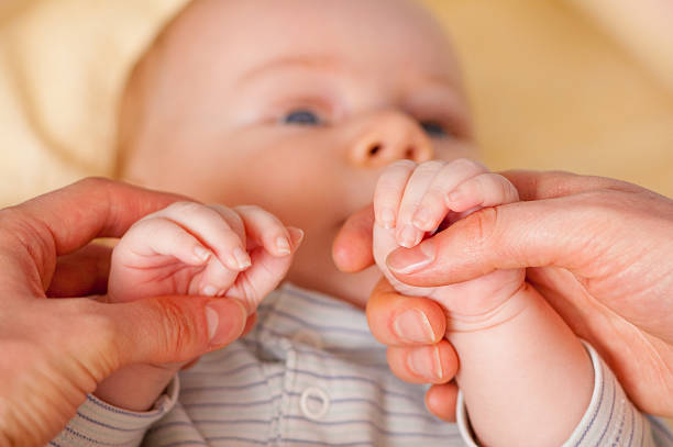 istock young mother with baby 618320820