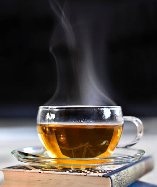 tazza di tè, scena delle bevande calde - glass tea herbal tea cup foto e immagini stock