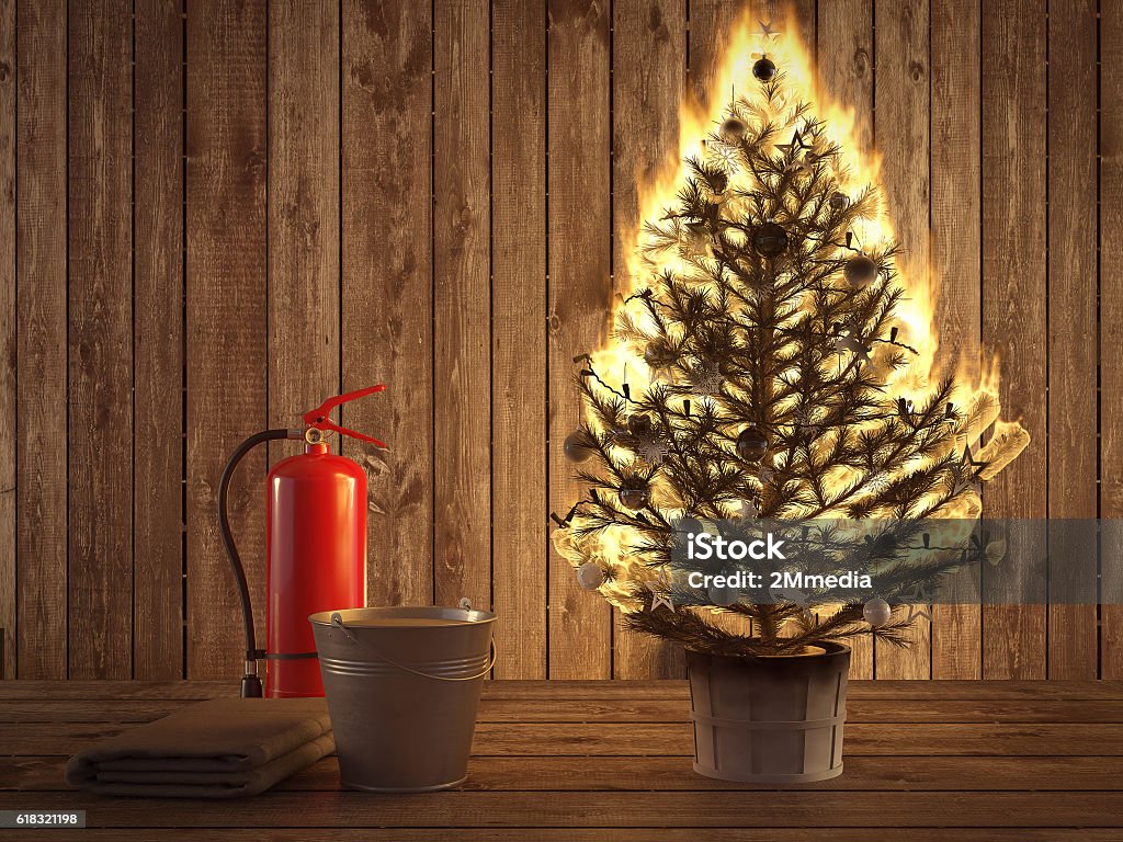 burning christmas tree with extinguisher and bucket beside. 3d rendering 3d rendering. burning christmas tree with fire extinguisher and bucket beside. Fire - Natural Phenomenon Stock Photo