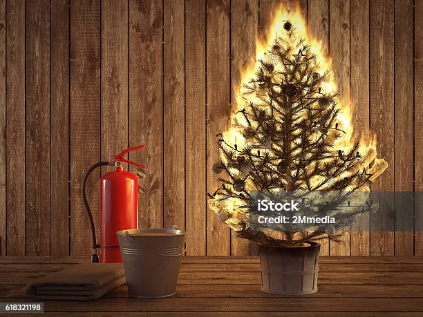 Burning Christmas Tree With Extinguisher And Bucket Beside 3d Rendering Stock Photo - Download Image Now