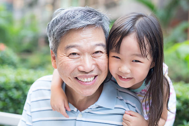 istock old man with granddaughter 618322970