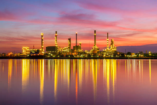 istock Oil refinery along the river at Dusk 618323130
