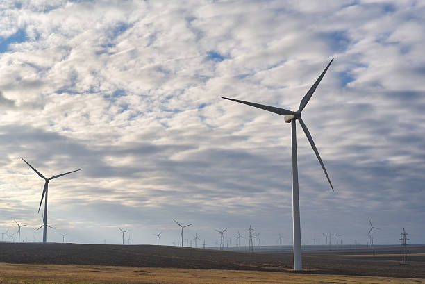 istock Eolian field and wind turbines farmon a cloudy day 618323216