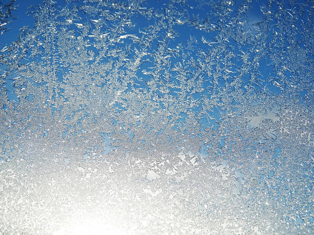 istock snowflakes on glass as winter texture background 618326542