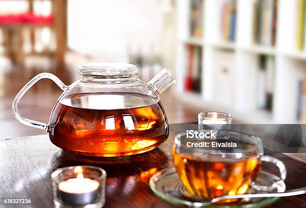 Teatime Scene Cup Of Tea And Teapot Stock Photo - Download Image Now - Black Tea, Cup, Teapot