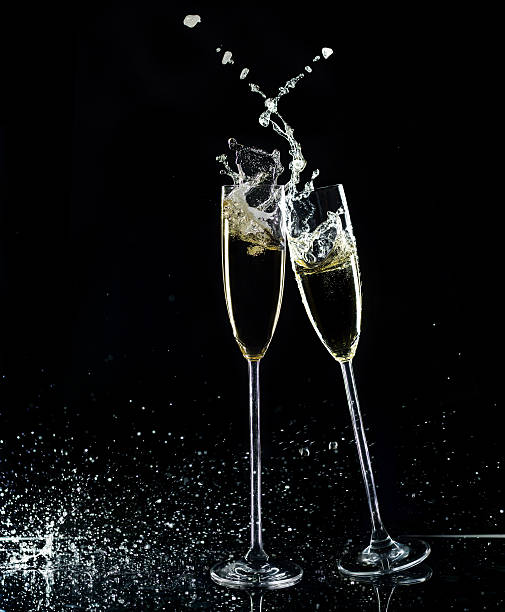 istock Champagne Glasses On Black Background 618328658