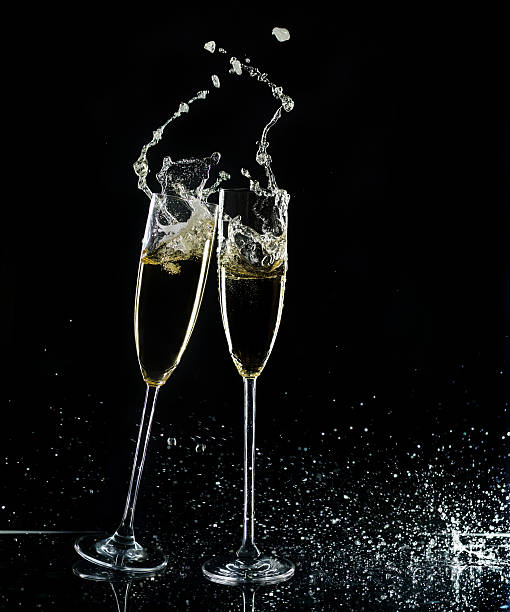istock Champagne Glasses On Black Background 618328798