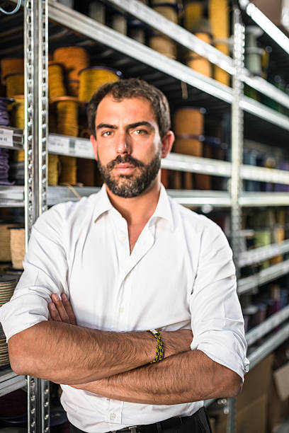 istock Industrial owner inside his factory 618329328