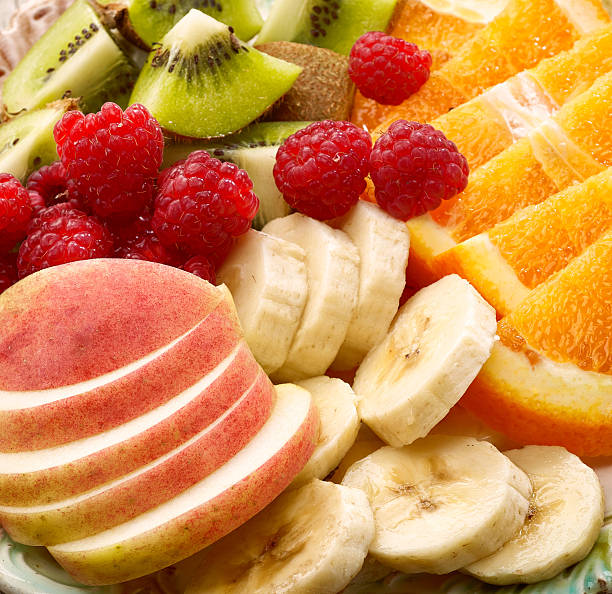 istock close up of fruit pieces and berries 618329500