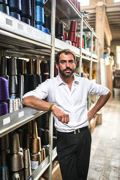 istock Industrial owner inside his factory 618329584