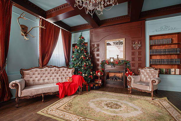 istock Christmas morning. classic apartments with a white fireplace, decorated tree 618332616