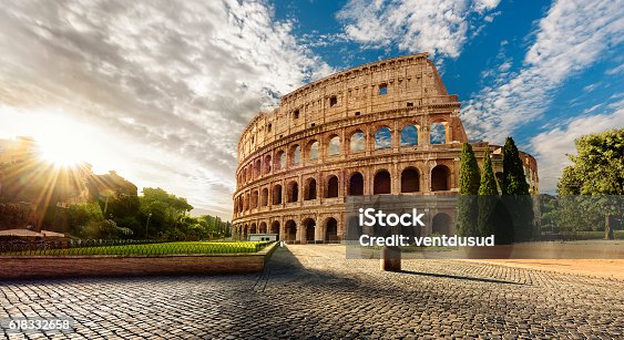 istock Colosseum in Rome and morning sun, Italy 618332658