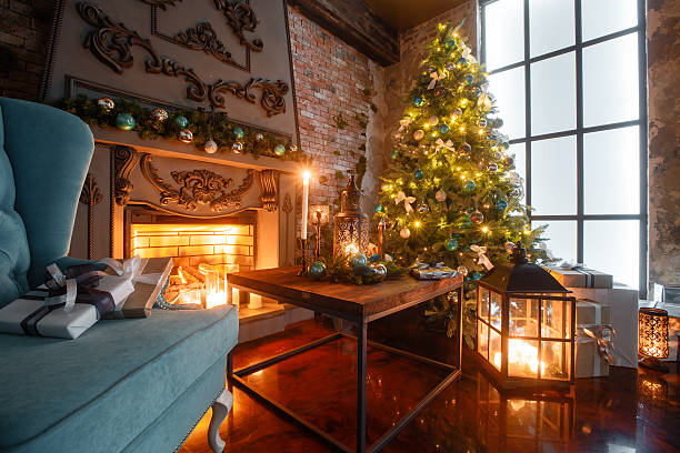 istock Christmas evening by candlelight. classic apartments with a white fireplace 618332944