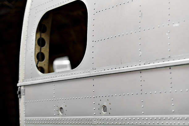 Detail with helicopter fuselage on the repair line in a factory