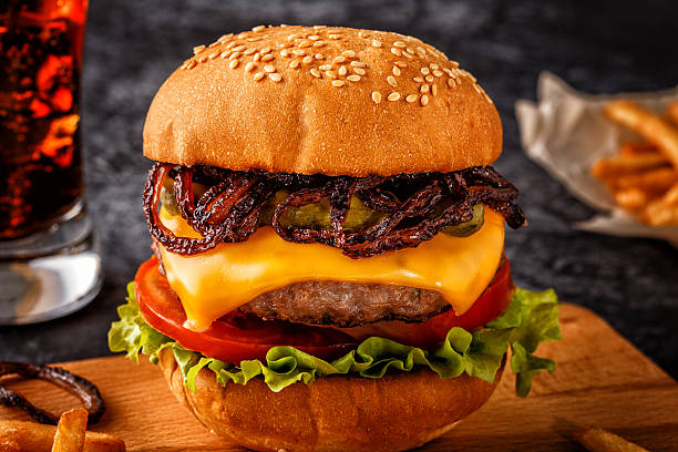 istock Burger, hamburger with french fries and fresh vegetables. 618341204