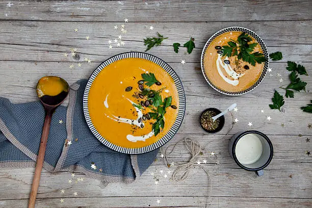 Pumpkin cream soup with Christmas decoration