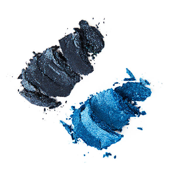 istock crumbled sparkling blue and teal eyeshadow on white background 618345202