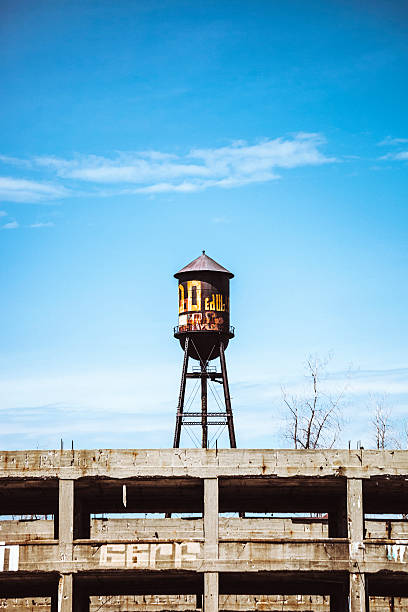 Chicago, Aug 23, 2016: An old water tower on a building in downtown late in the day in the loop.