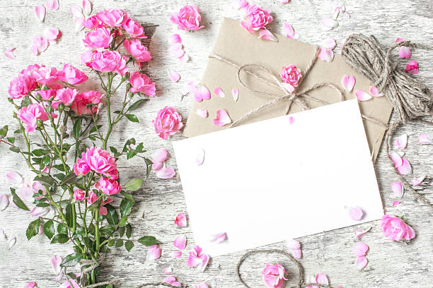 istock blank white greeting card with pink roses bouquet 618349930