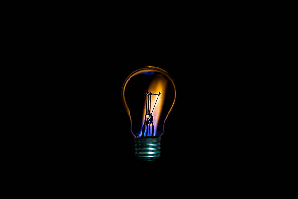 istock Bulb and candle fusion concept 618352304