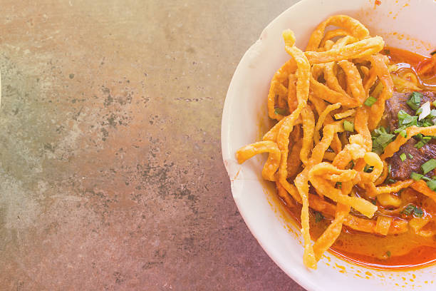 istock Khao Soi Thai Noodle Curry Soup with chicken 618355334