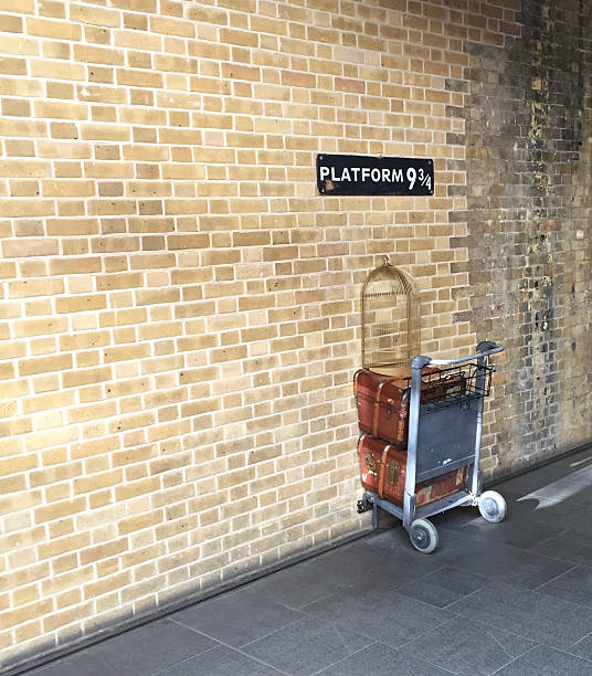 London, England - July 19, 2016: Platform nine and three-quarters at King's Cross railway station, London, made famous in J K Rowling's Harry Potter series of books and films.