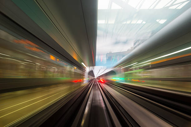 istock Speed motion in urban highway road tunnel 618357516