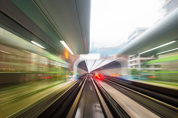 istock Speed motion in urban highway road tunnel 618357580