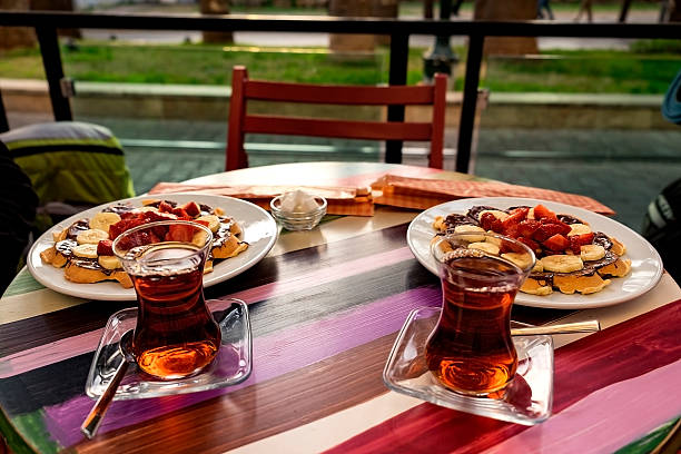 istock Two cups of Turkish tea with the dessert 618357922