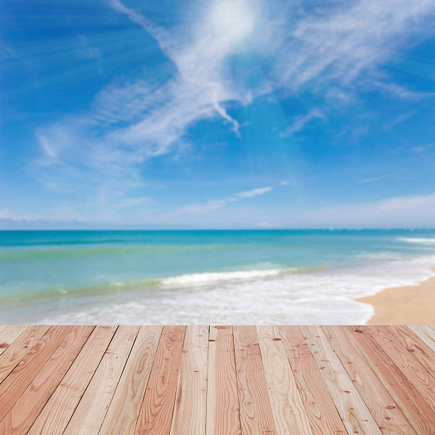 istock wooden floor with beautiful blue sky scenery for background. 618358210