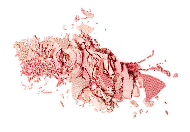 istock crumbled pink blush and powder on white background 618358506