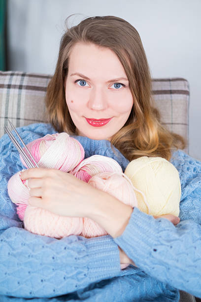 istock Knitter girl with yarn 618361152