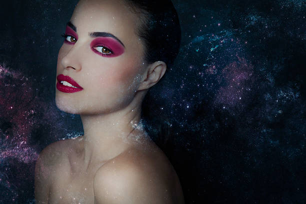 istock beautiful fantasy woman among stardust 618420636