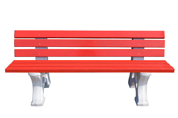 istock Red wooden Park bench on a stone legs, isolated on 618421458