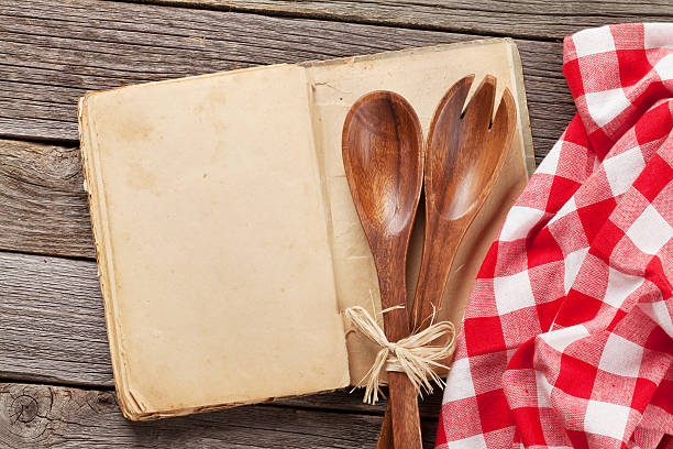 istock Blank vintage recipe cooking book and utensils 618421532