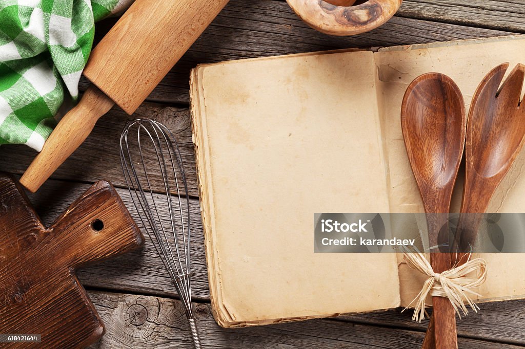 Blank vintage recipe cooking book and utensils Blank vintage recipe cooking book and utensils. Top view with copy space Recipe Stock Photo