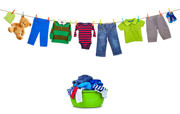 istock Laundry line with colorful clothes and plastic wash bowl 618422414