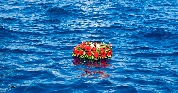 memorial wreaths on the sea for sailors